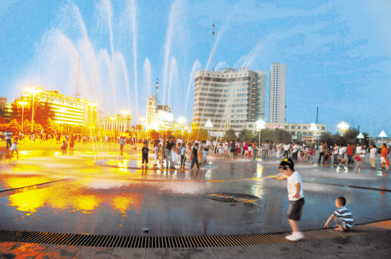 资料图片:夜幕下的包头阿尔丁广场.